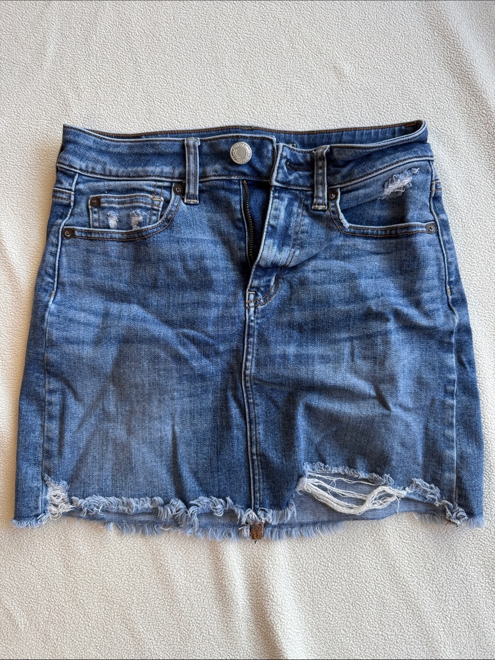 Classic Blue Denim Mini Skirt with Distressed Hem size 2